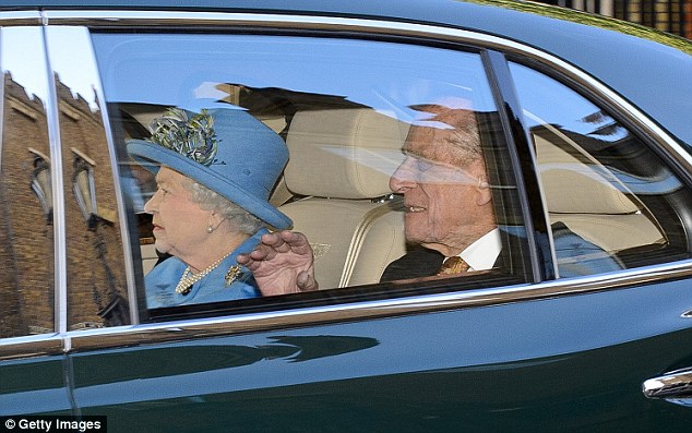 The Queen arrives in regal blue with Philip (via Daily Mail)